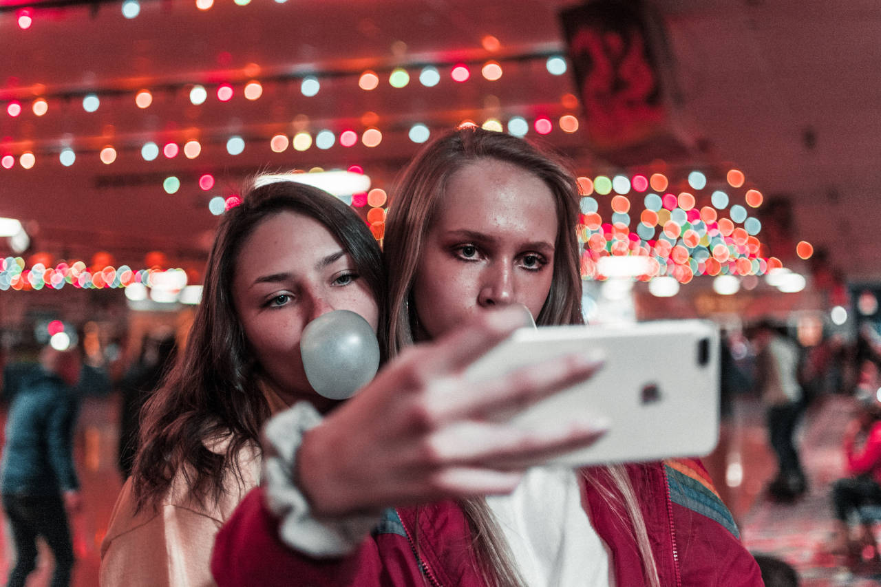 Selfie with my half. Love you. Attractive young couple is taking a selfie  on camera, girl kisses her boyfriend, they are indoors at home Stock Photo  | Adobe Stock