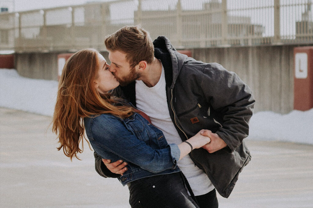Girlfriend in Denim Dress with Crossed Arms and Smiling Boyfriend in Jeans  and Shirt Hugging and Looking at Camera Stock Photo - Image of footwear,  couple: 177252046